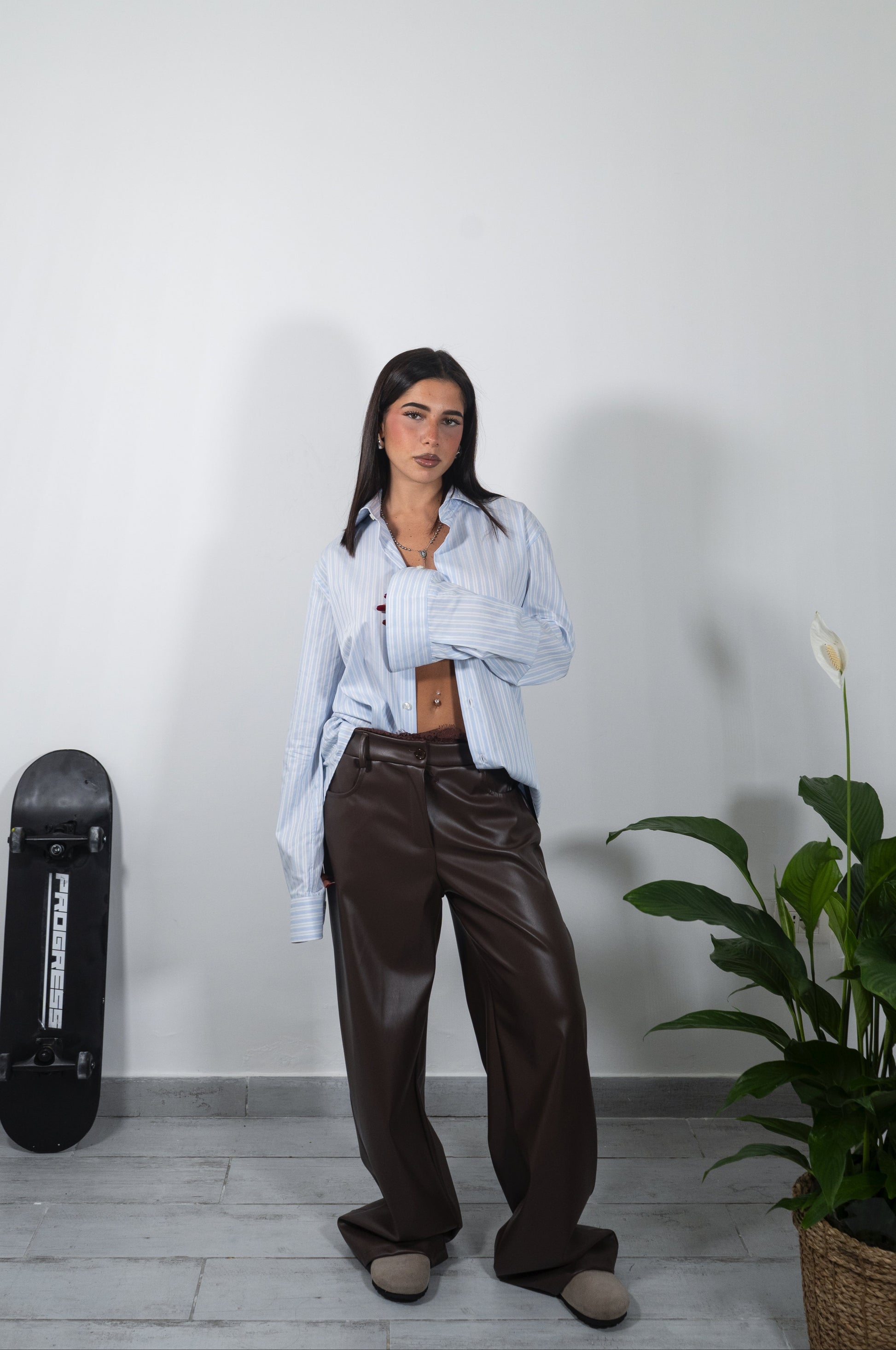 Embroidered faux leather trousers