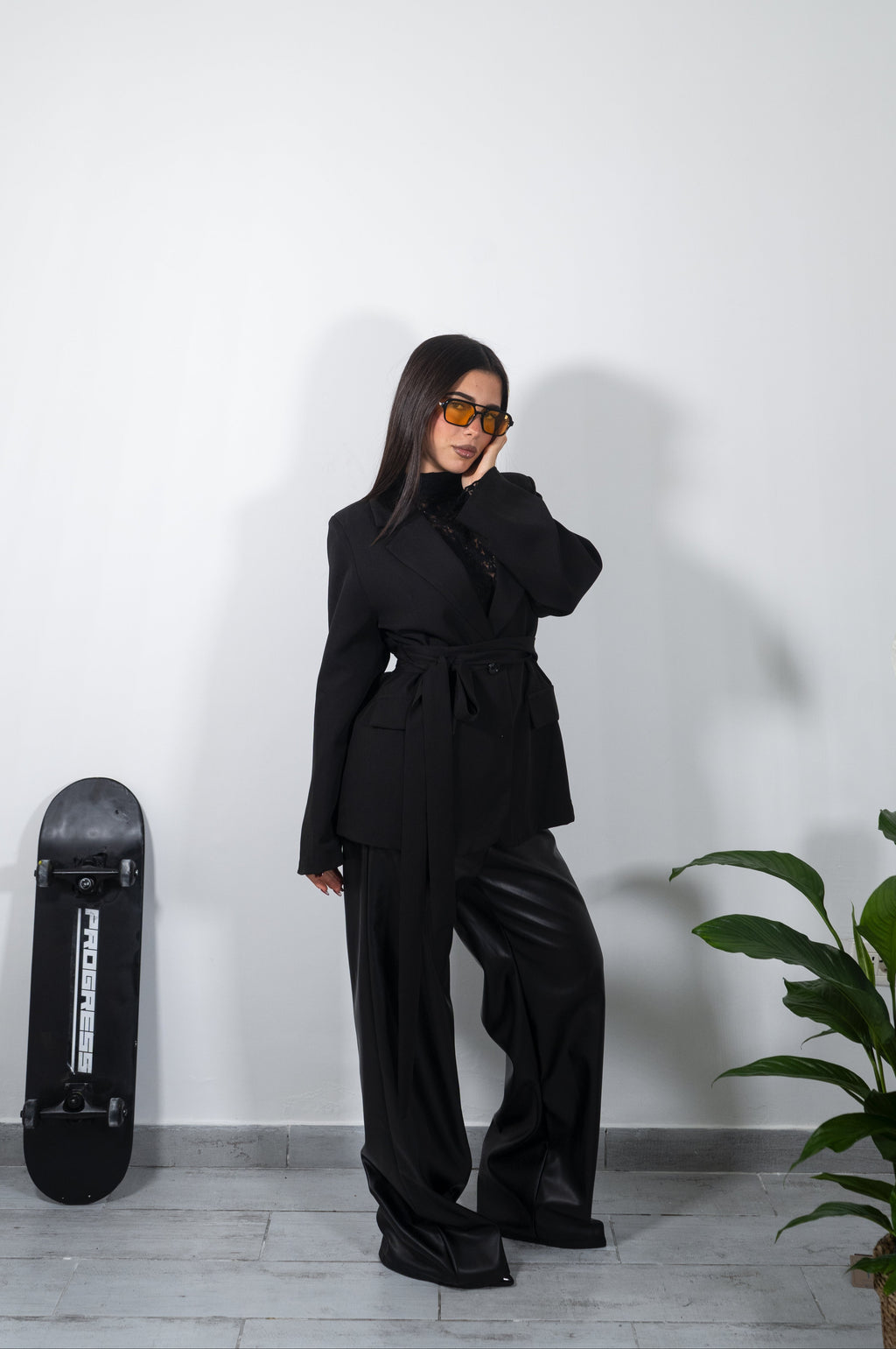 Embroidered faux leather trousers